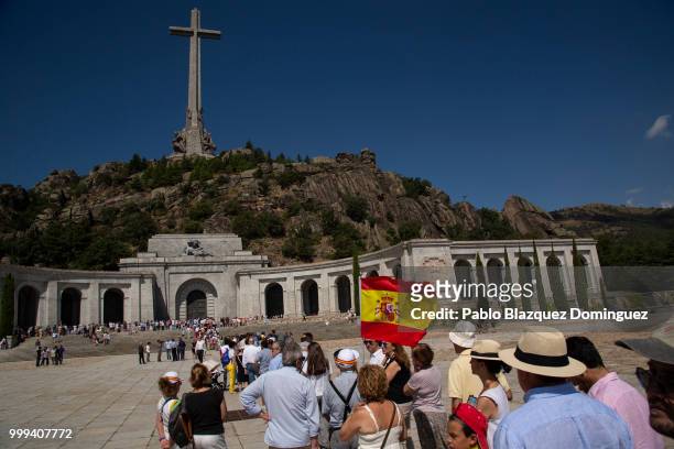 People queue to enter the El Valle de los Caidos monument during a gathering under the slogan 'Don't touch the valley' on July 15, 2018 near San...