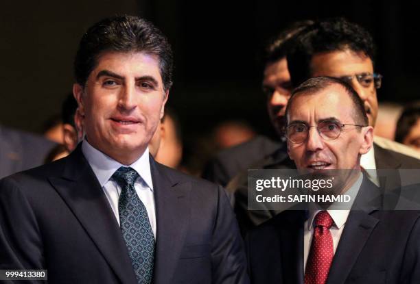 Dominique Mas , the French Consul General in Arbil, and Nechirvan Barzani, Prime Minister of Iraq's Kurdistan Regional Government, attend French...