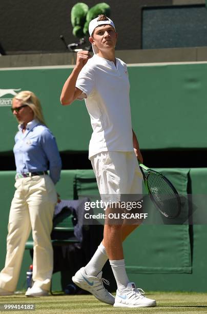 Britain's Jack Draper celebrates winning a point against Taiwan's Tseng Chun Hsin during their boys's singles final match on the thirteenth day of...