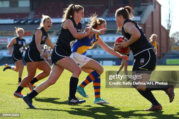 Kristi Harvey of the Blues runs with the ball during the round 10 VFLW match between Carlton Blues and Williamstown Seagulls at Ikon Park on July 15,...