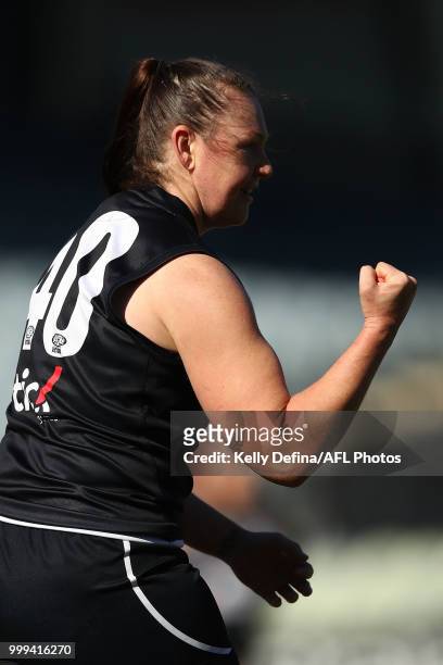 Kristi Harvey of the Blues celebrates her goal during the round 10 VFLW match between Carlton Blues and Williamstown Seagulls at Ikon Park on July...