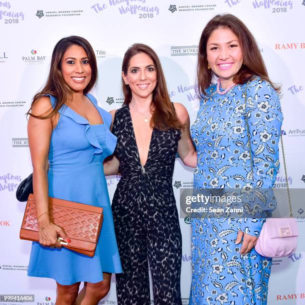 Divya Mehra, Nikki Trager and Giselle Malfitano attend The Samuel Waxman Cancer Research Foundation 14th Annual The Hamptons Happening on July 14,...