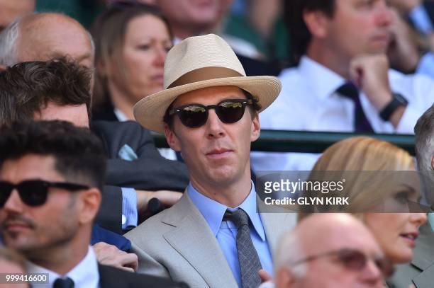 British actor Benedict Cumberbatch sits in the Royal Box before South Africa's Kevin Anderson plays Serbia's Novak Djokovic in their men's singles...