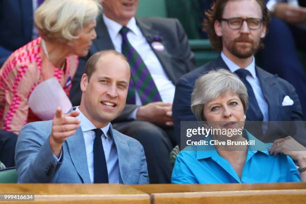 Prince William, Duke of Cambridge sits next to British Prime Minister Theresa May as they attend the Men's Singles final on day thirteen of the...