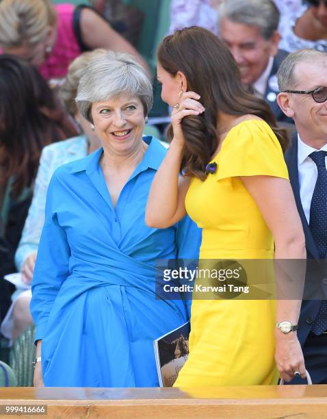Prime Minister Theresa May and Catherine, Duchess of Cambridge attend the men's singles final on day thirteen of the Wimbledon Tennis Championships...