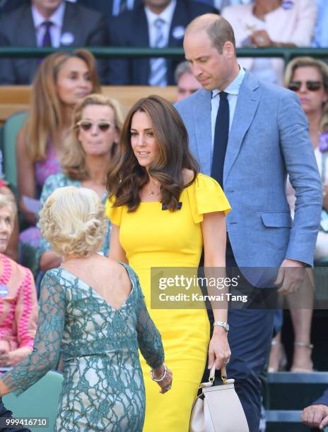 Catherine, Duchess of Cambridge and Prince William, Duke of Cambridge attend the men's singles final on day thirteen of the Wimbledon Tennis...