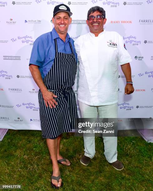 Scott Kampf and Chef Marco Barrila attend The Samuel Waxman Cancer Research Foundation 14th Annual The Hamptons Happening on July 14, 2018 in...