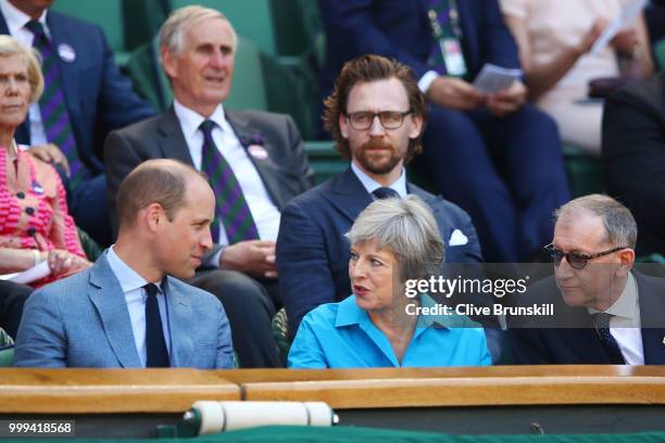 Prince William, Duke of Cambridge speaks with British Prime Minister Theresa May and her husband Philip May as they attend the Men's Singles final on...