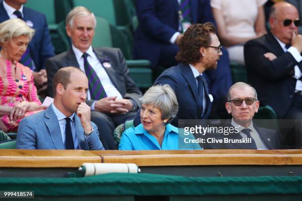 Prince William, Duke of Cambridge speaks with British Prime Minister Theresa May and her husband Philip May as they attend the Men's Singles final on...