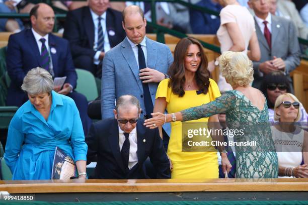 Catherine, Duchess of Cambridge and Prince William, Duke of Cambridge with British Prime Minister Theresa May and her husband Philip May and Gill...