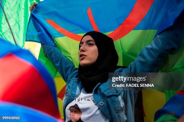 Moroccan demonstrator shouts slogans as he protests on July 15 against the jailing of leaders and activists of a northern protest movement, in the...