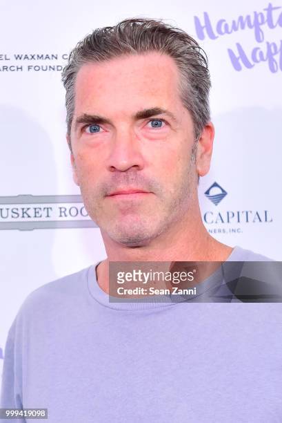 Guest attends The Samuel Waxman Cancer Research Foundation 14th Annual The Hamptons Happening on July 14, 2018 in Bridgehampton, New York.