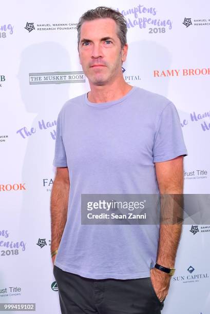Guest attends The Samuel Waxman Cancer Research Foundation 14th Annual The Hamptons Happening on July 14, 2018 in Bridgehampton, New York.