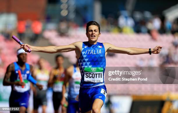 Edoardo Scotti of Italy crosses the finish line to win Italy gold in the final of the men's 4x400m relay on day six of The IAAF World U20...