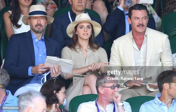 John Vosler, Emma Watson and Luke Evans attend the men's singles final on day thirteen of the Wimbledon Tennis Championships at the All England Lawn...