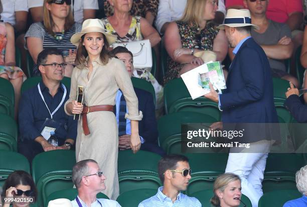 Emma Watson and John Vosler attend the men's singles final on day thirteen of the Wimbledon Tennis Championships at the All England Lawn Tennis and...