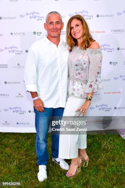 Jon Meltzer and Amy Meltzer attend The Samuel Waxman Cancer Research Foundation 14th Annual The Hamptons Happening on July 14, 2018 in Bridgehampton,...