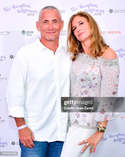 Jon Meltzer and Amy Meltzer attend The Samuel Waxman Cancer Research Foundation 14th Annual The Hamptons Happening on July 14, 2018 in Bridgehampton,...