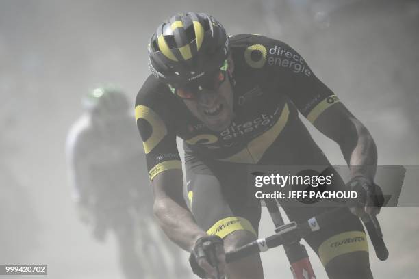 France's Damien Gaudin leads a two-men breakaway through the dust of a cobblestone section during the ninth stage of the 105th edition of the Tour de...