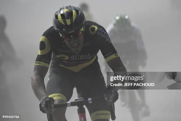 France's Damien Gaudin leads a two-men breakaway through the dust of a cobblestone section during the ninth stage of the 105th edition of the Tour de...