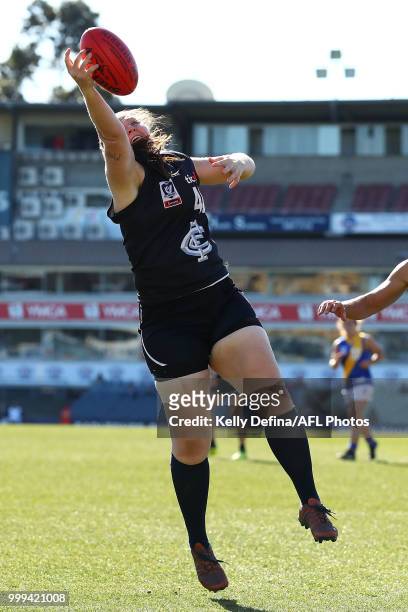Kristi Harvey of the Blues marks the ball during the round 10 VFLW match between Carlton Blues and Williamstown Seagulls at Ikon Park on July 15,...