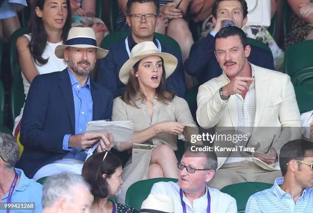 John Vosler, Emma Watson and Luke Evans attend the men's singles final on day thirteen of the Wimbledon Tennis Championships at the All England Lawn...