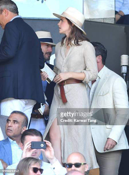 Emma Watson attends the men's singles final on day thirteen of the Wimbledon Tennis Championships at the All England Lawn Tennis and Croquet Club on...