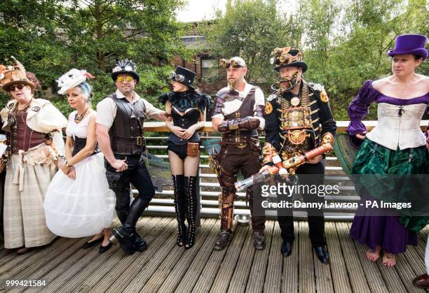 Steampunks take part in a fashion show during the Hebden Bridge Steampunk Festival in West Yorkshire.
