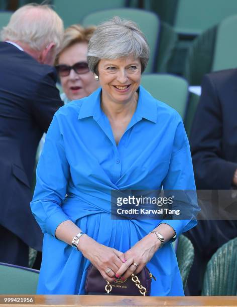 Prime Minister Theresa May attends the men's singles final on day thirteen of the Wimbledon Tennis Championships at the All England Lawn Tennis and...