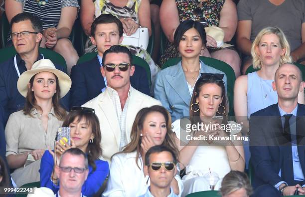 Tom Holland and Gemma Chan Emma Watson and Luke Evans attend the men's singles final on day thirteen of the Wimbledon Tennis Championships at the All...