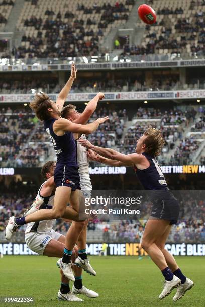 Joel Hamling of the Dockers and Ollie Wines of the Power contest for a mark during the round 17 AFL match between the Fremantle Dockers and the Port...