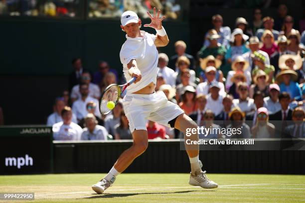 Kevin Anderson of South Africa returns against Novak Djokovic of Serbia during the Men's Singles final on day thirteen of the Wimbledon Lawn Tennis...