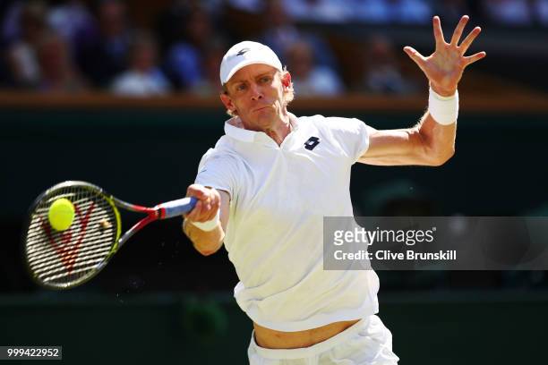 Kevin Anderson of South Africa returns against Novak Djokovic of Serbia during the Men's Singles final on day thirteen of the Wimbledon Lawn Tennis...