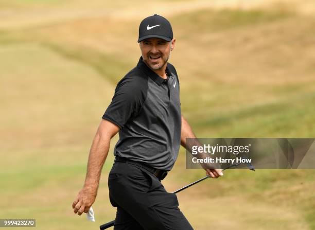 Trevor Immelman of South Africa reacts to his birdie putt on hole one during day four of the Aberdeen Standard Investments Scottish Open at Gullane...
