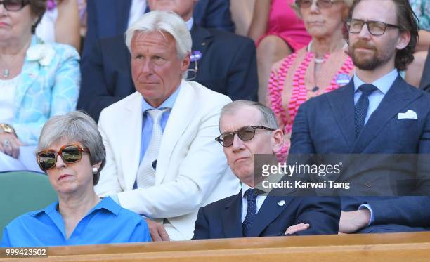 Bjorn Borg and Tom Hiddleston Prime Minister Theresa May and Philip May attend the men's singles final on day thirteen of the Wimbledon Tennis...