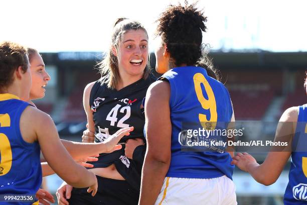 Caroline Hardeman of the Blues and Rachel Achampong of the Seagulls excahnge words after a collision during the round 10 VFLW match between Carlton...