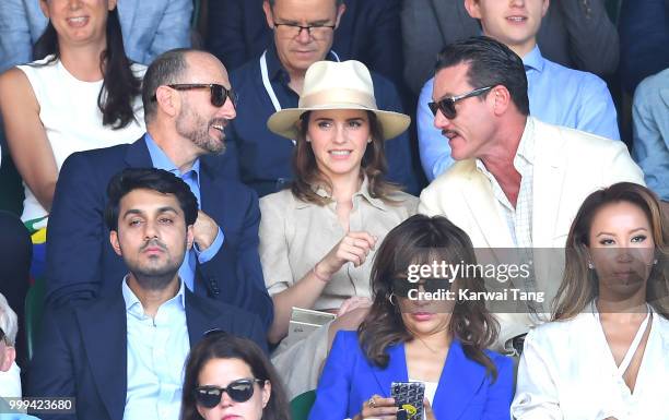 John Vosler, Emma Watson and Luke Evans attend the men's singles final on day thirteen of the Wimbledon Tennis Championships at the All England Lawn...