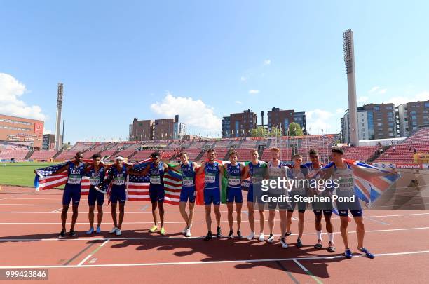The USA, Italy and Great Britain teams pose for a picture following the final of the men's 4x400m relay on day six of The IAAF World U20...