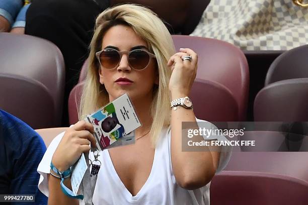 The wife of France's forward Antoine Griezmann Erika Choperenea waits for the start of the Russia 2018 World Cup final football match between France...