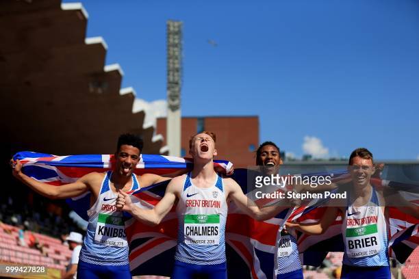 Alex Haydock-Wilson, Joseph Brier, Alastair Chalmers and Alex Knibbs of Great Britain celebrate winning bronze in the final of the men's 4x400m relay...