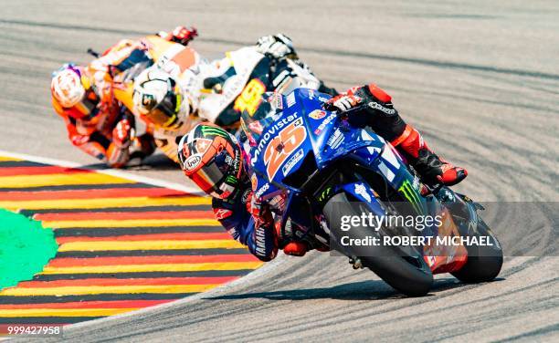 Spanish Yamaha rider Maverick Vinales competes to placed third in the Moto GP race at the Grand Prix of Germany at the Sachsenring Circuit on July...