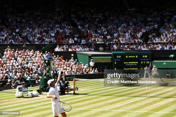 Novak Djokovic of Serbia serves against Kevin Anderson of South Africa during the Men's Singles final on day thirteen of the Wimbledon Lawn Tennis...