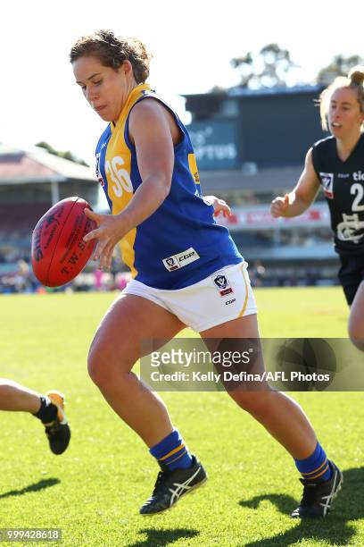 Megan Williamson of the Seagulls kicks the ball during the round 10 VFLW match between Carlton Blues and Williamstown Seagulls at Ikon Park on July...
