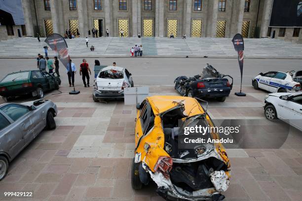 Vehicles damaged by tanks on July 15 defeated coup are displayed at garden of Grand National Assembly of Turkey within the July 15 Democracy and...