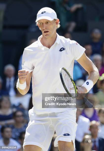 Kevin Anderson of South Africa reacts after winning a point against Novak Djokovic of Serbia during the Wimbledon final match in London on July 15,...