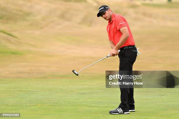 Dean Burmester of South Africa reacts to his par putt on hole one during day four of the Aberdeen Standard Investments Scottish Open at Gullane Golf...