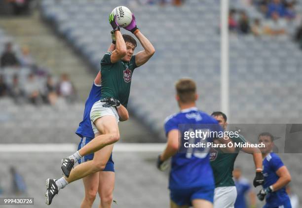 Dublin , Ireland - 15 July 2018; Kevin Feely of Kildare catches a kick-out ahead of Kieran Duffy of Monaghan during the GAA Football All-Ireland...