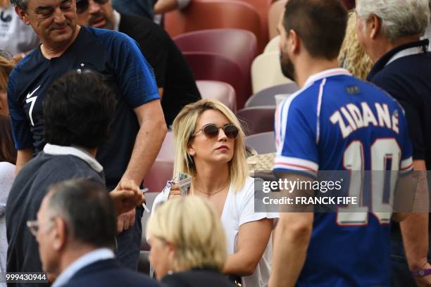 The wife of France's forward Antoine Griezmann Erika Choperenea waits for the start of the Russia 2018 World Cup final football match between France...