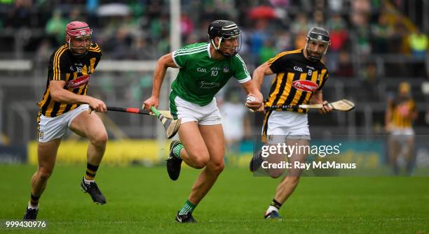 Thurles , Ireland - 15 July 2018; Gearoid Hegarty of Limerick in action against Robert Lennon, left, and Conor Fogarty of Kilkenny during the GAA...