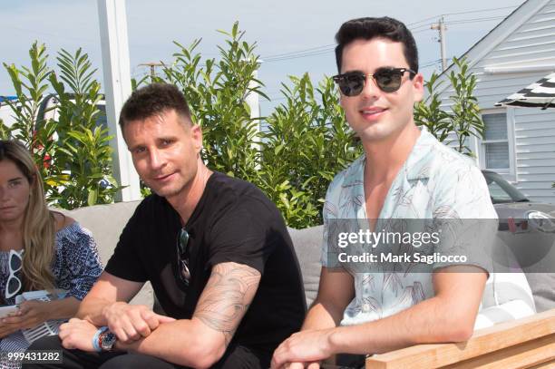 Bernd Kroeber and Alfonso Zamarripa attend the Modern Luxury + The Next Wave at Breakers Montauk on July 14, 2018 in Montauk, New York.